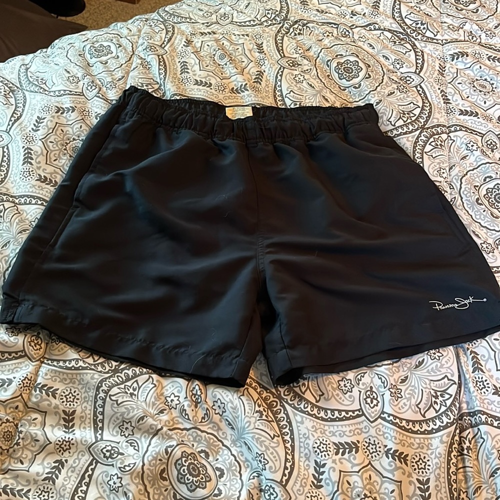 Panama Jack black shorts with mesh lining; coastal summer beach. 3 pockets